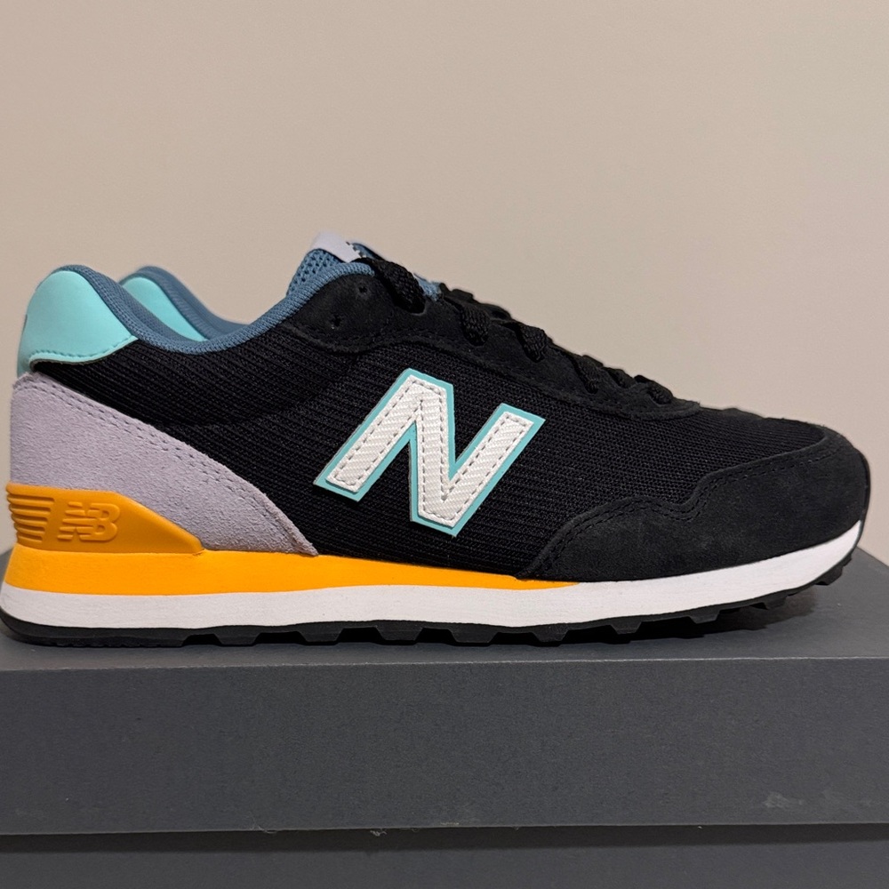 New Balance Black Sneakers with Orange, Violet and Aqua Highlights